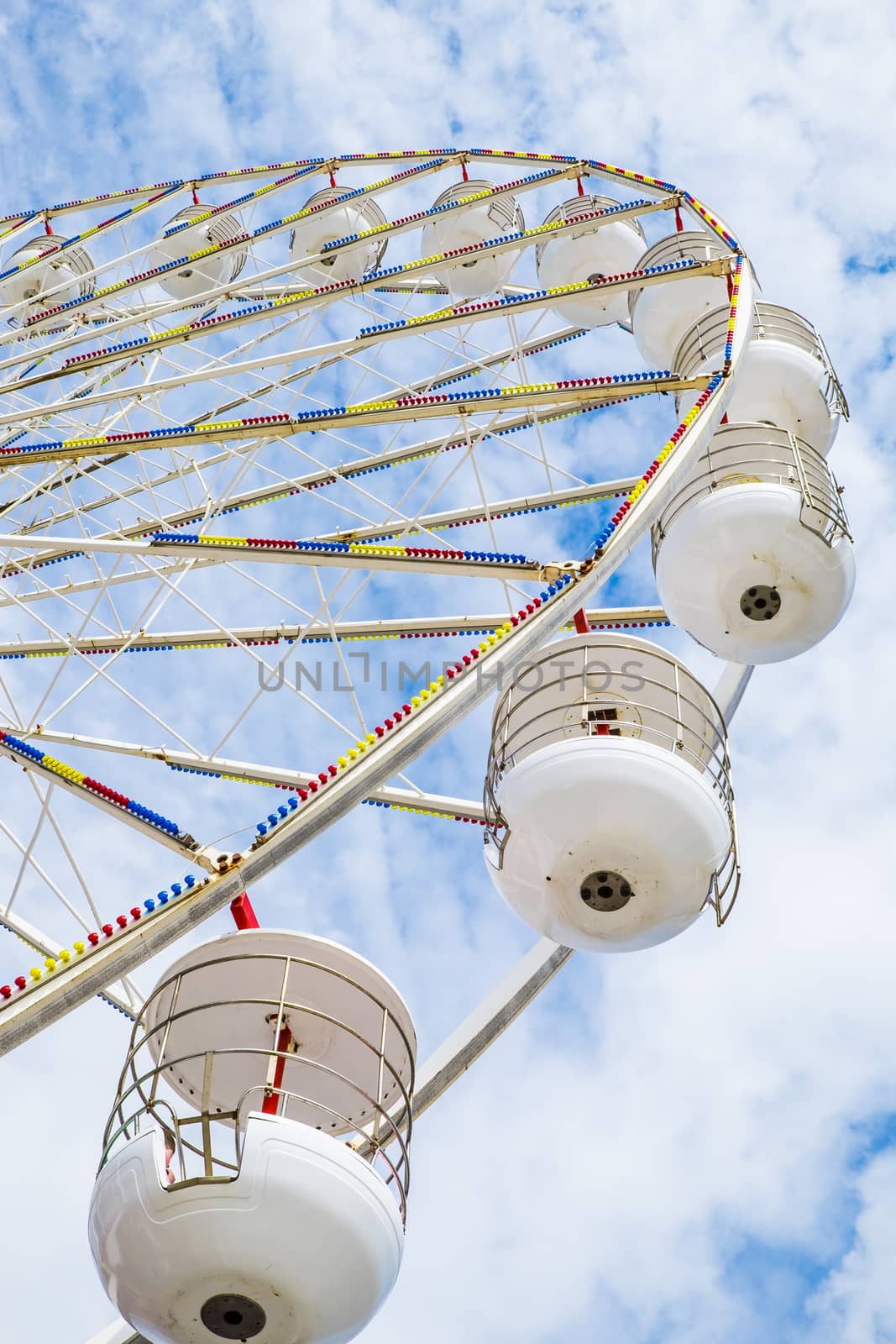 Ferris wheel on the pier at Blackpool against blue sky