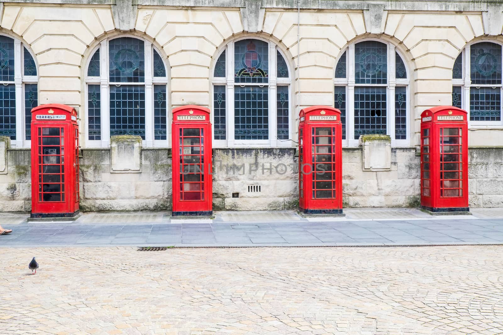 Row of beautiful old fashioned British red Telephone boxes