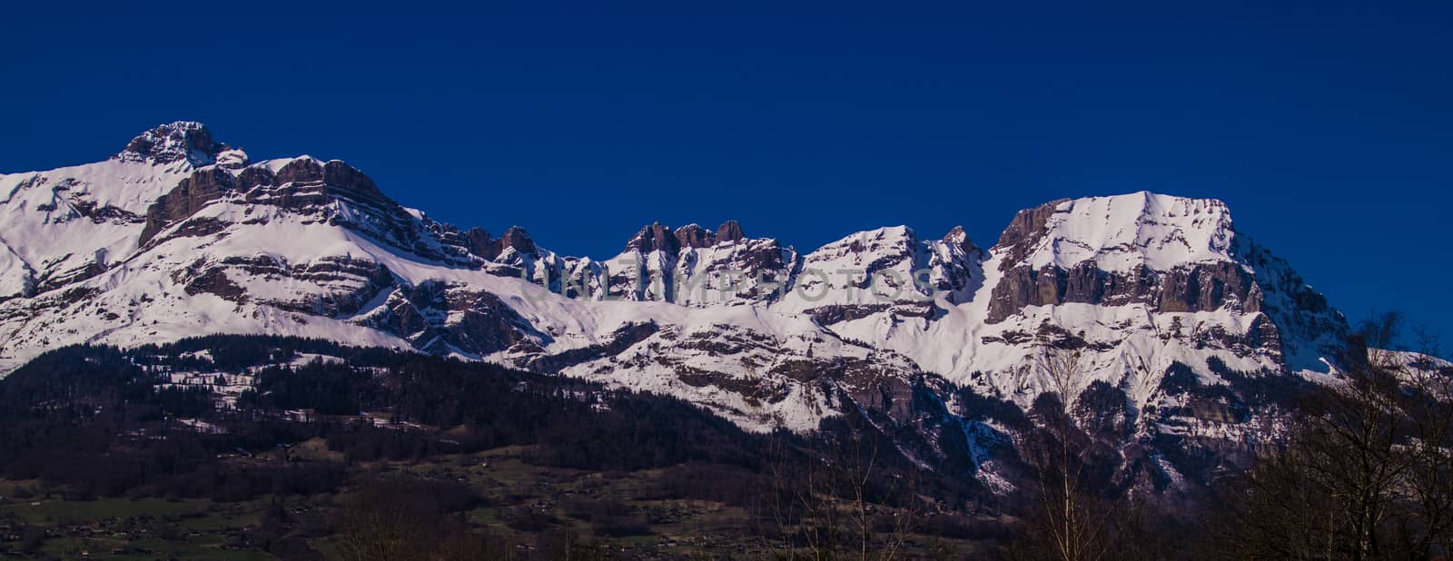 winter landscape in the french alps by bertrand