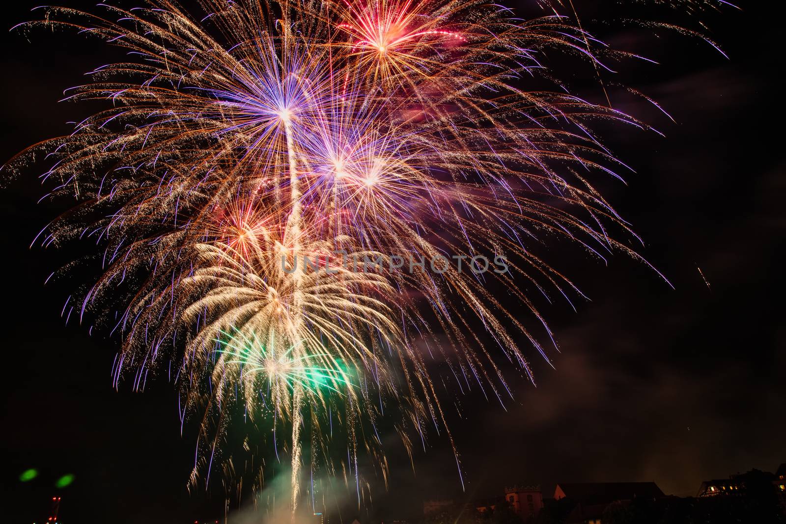 Colorful fireworks of various colors over night sky