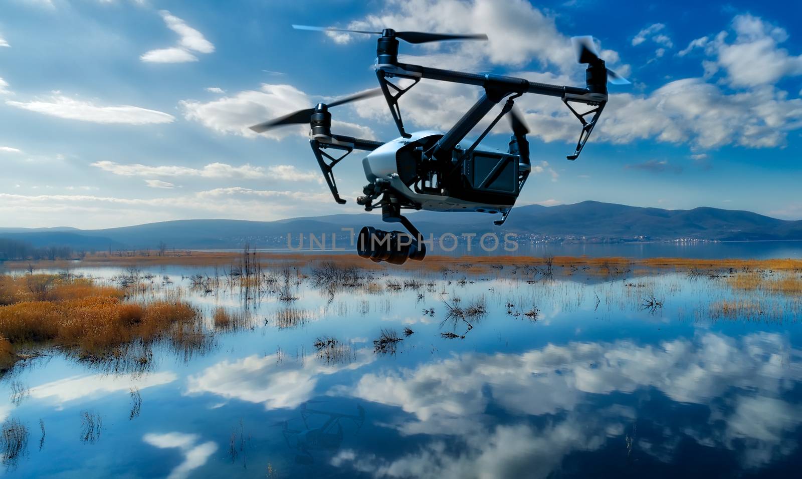 Drone flight over lake by ververidis
