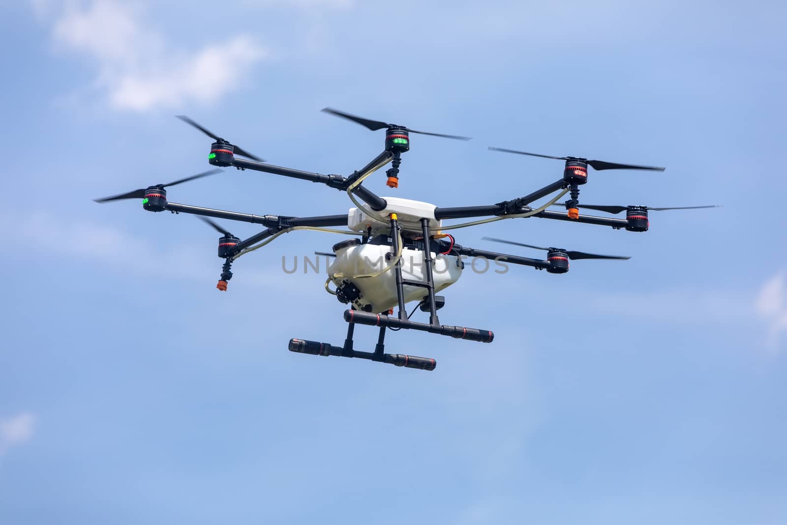 Thessaloniki, Greece - June 21, 2018: Professional agriculture drone on the green field during the test flight