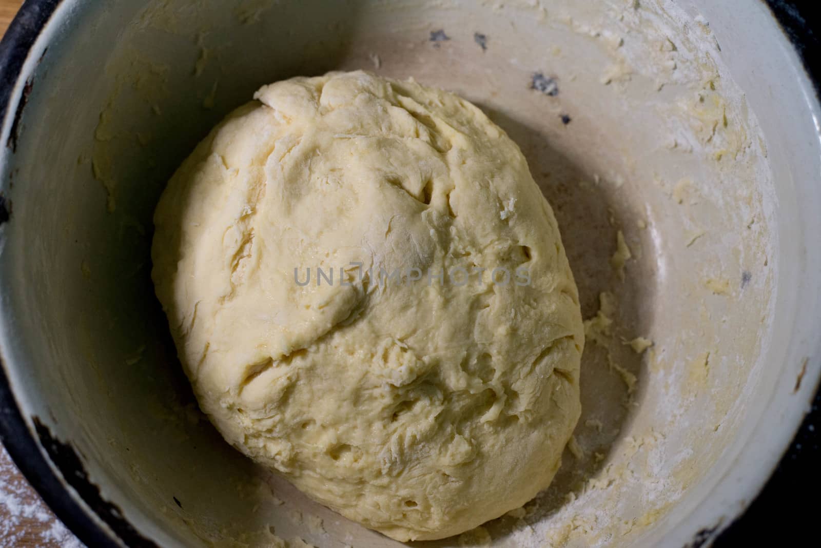 Knead the dough in a bowl by SemFid