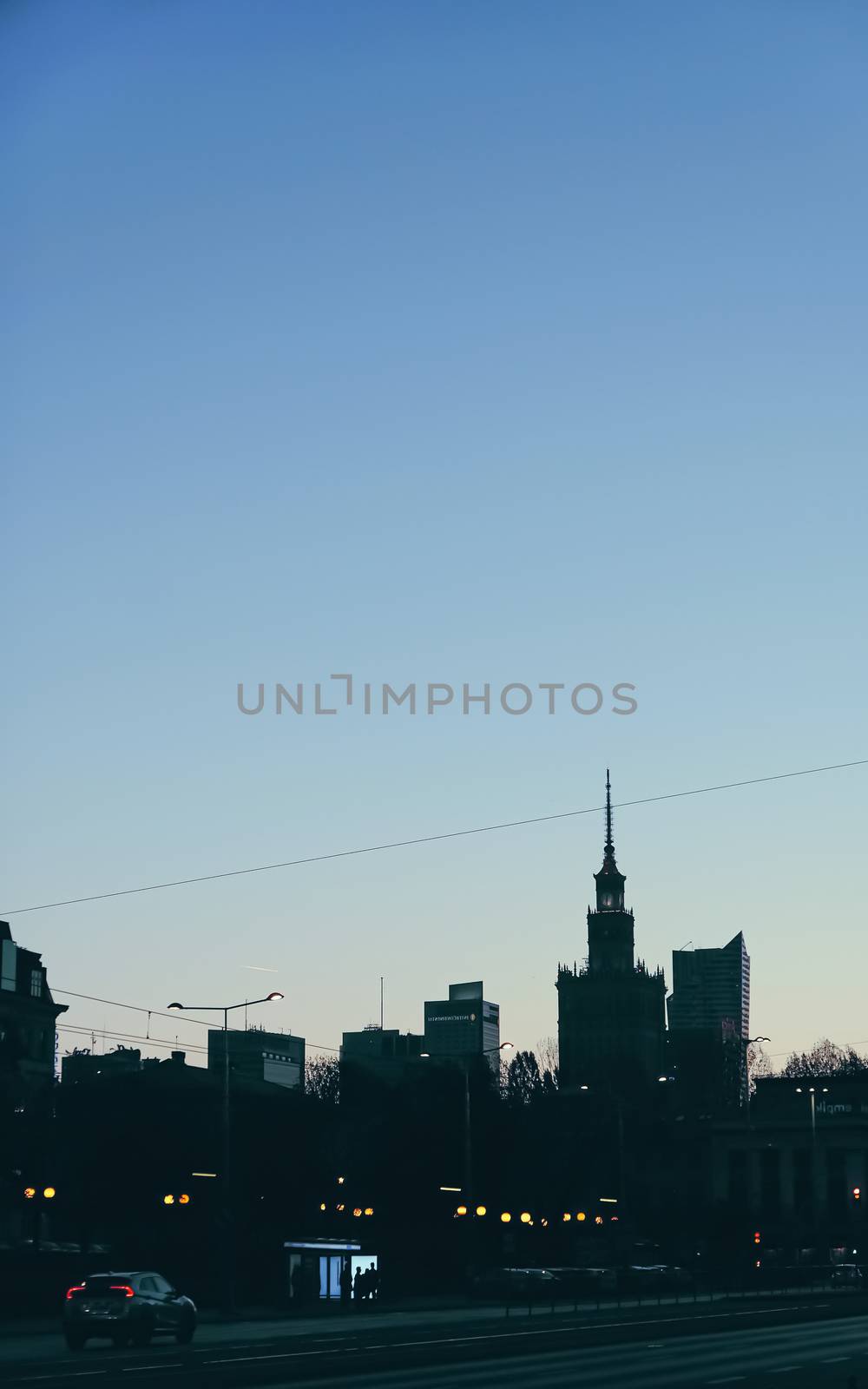 Cityscape silhouette of a European city as background, evening view by Anneleven