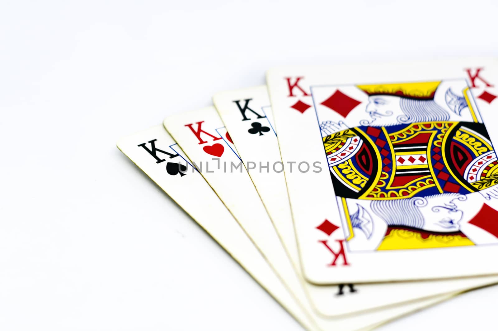 playing cards depicting the four kings isolated on a white background. King poker. Gambling and luck