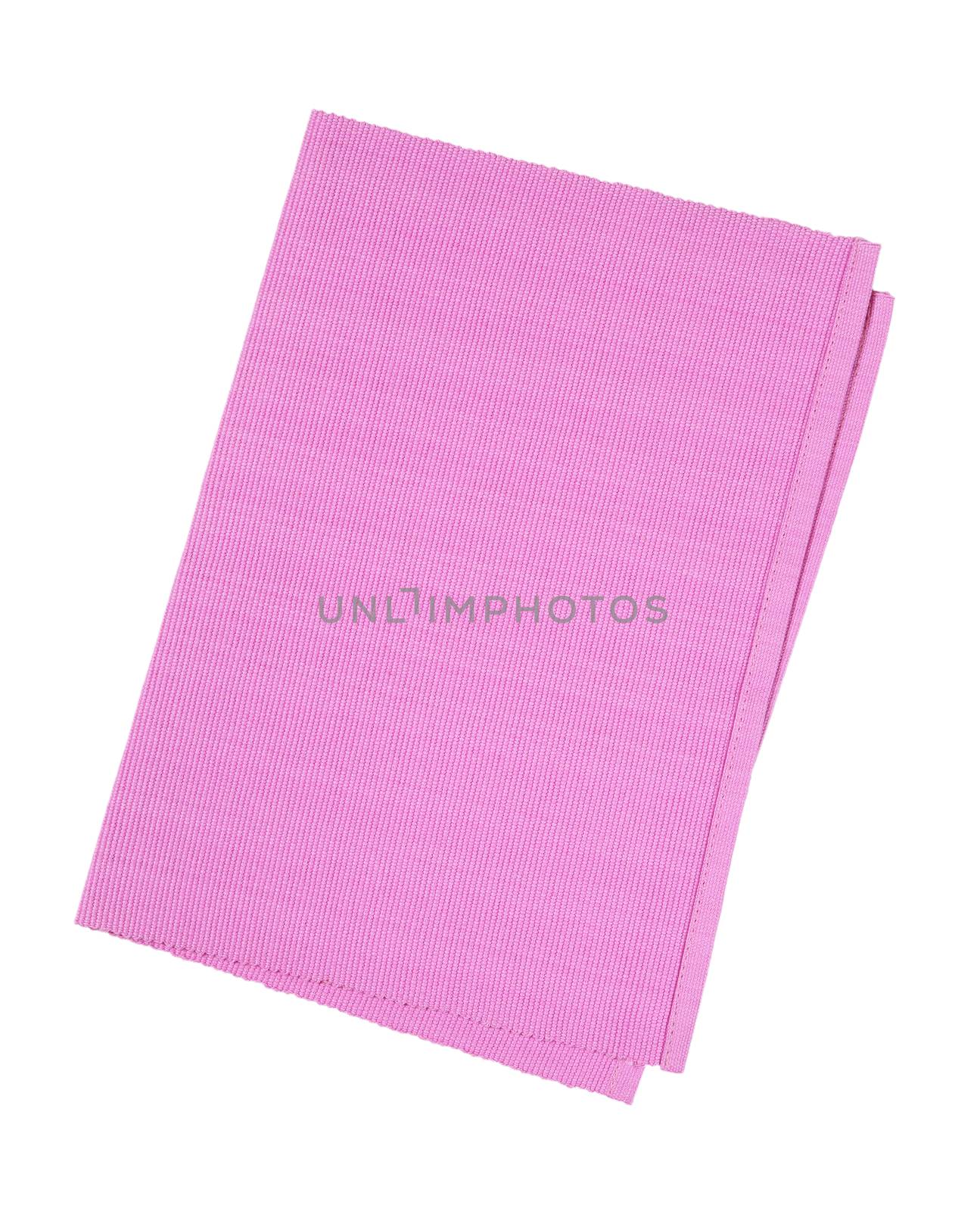 Pink woven cotton place mat folded in half isolated on white
