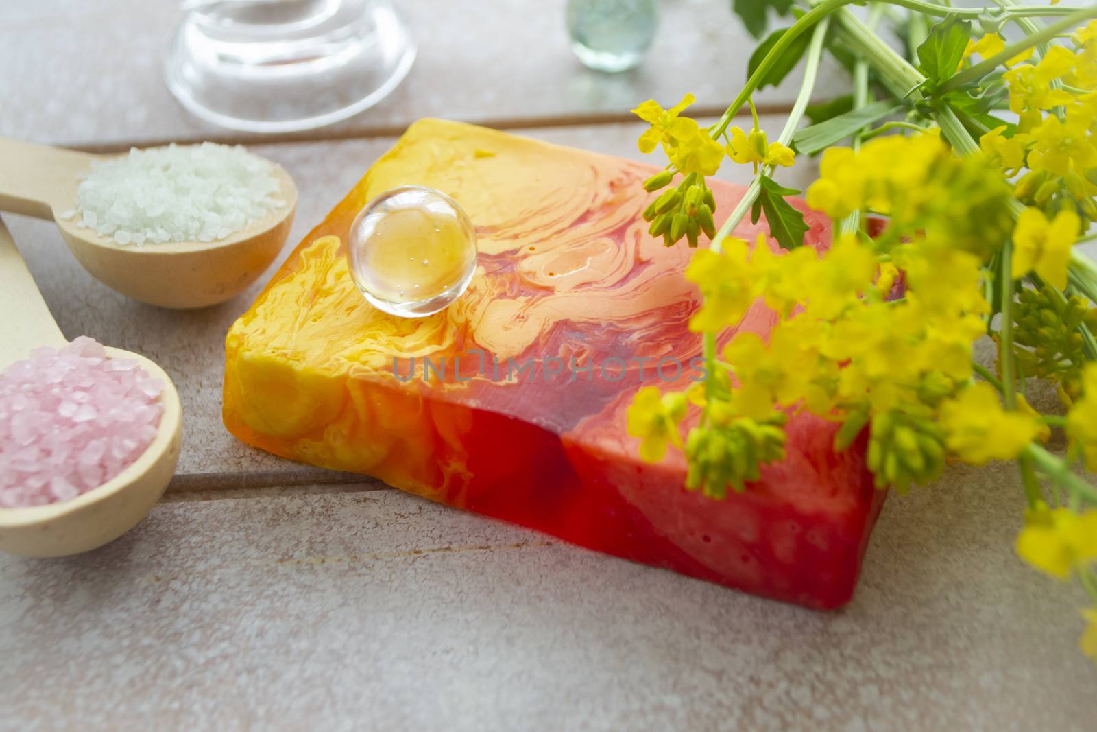 organic handmade body soap. Red and yellow bright souvenir soap with yellow flowers