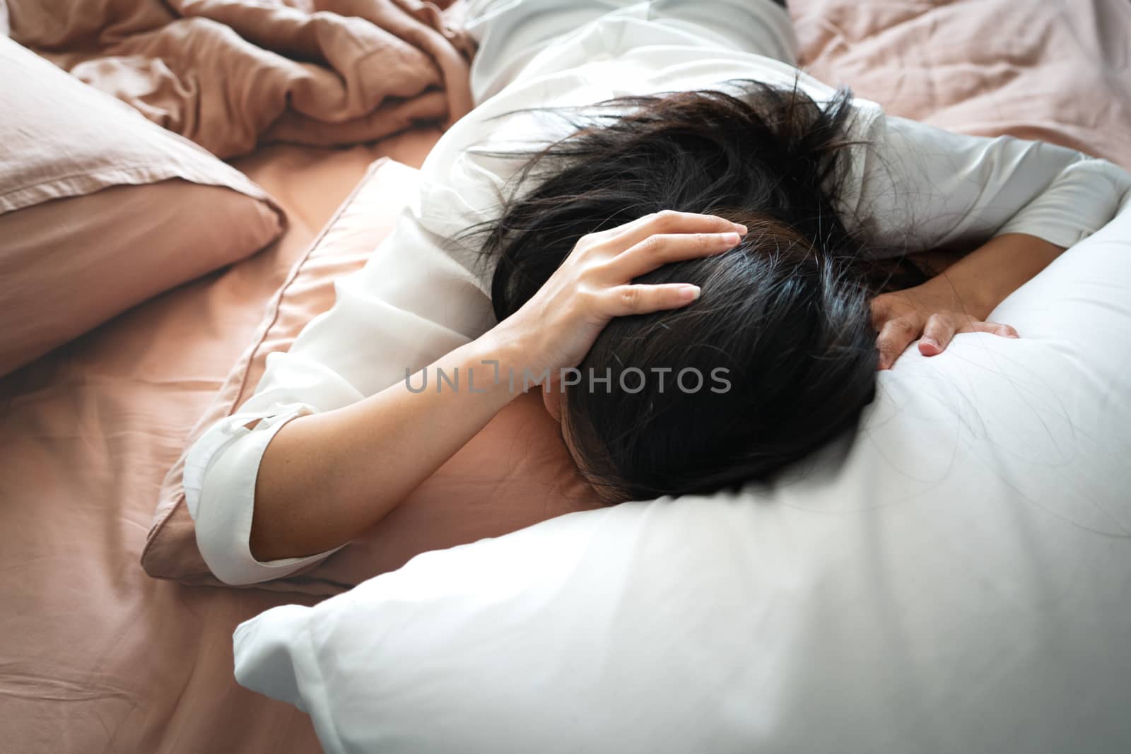 Sleepy woman hates waking up early in the morning