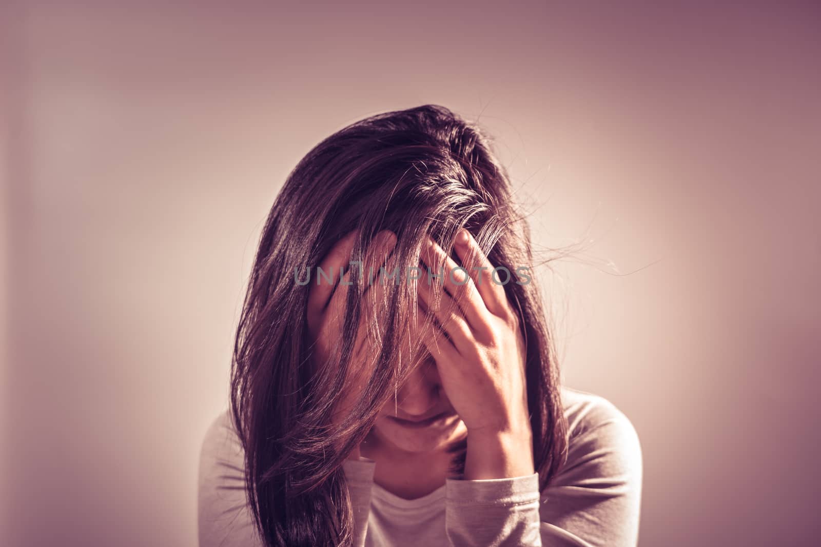 depressed women sitting in the dark room, alone, sadness, emotional concept