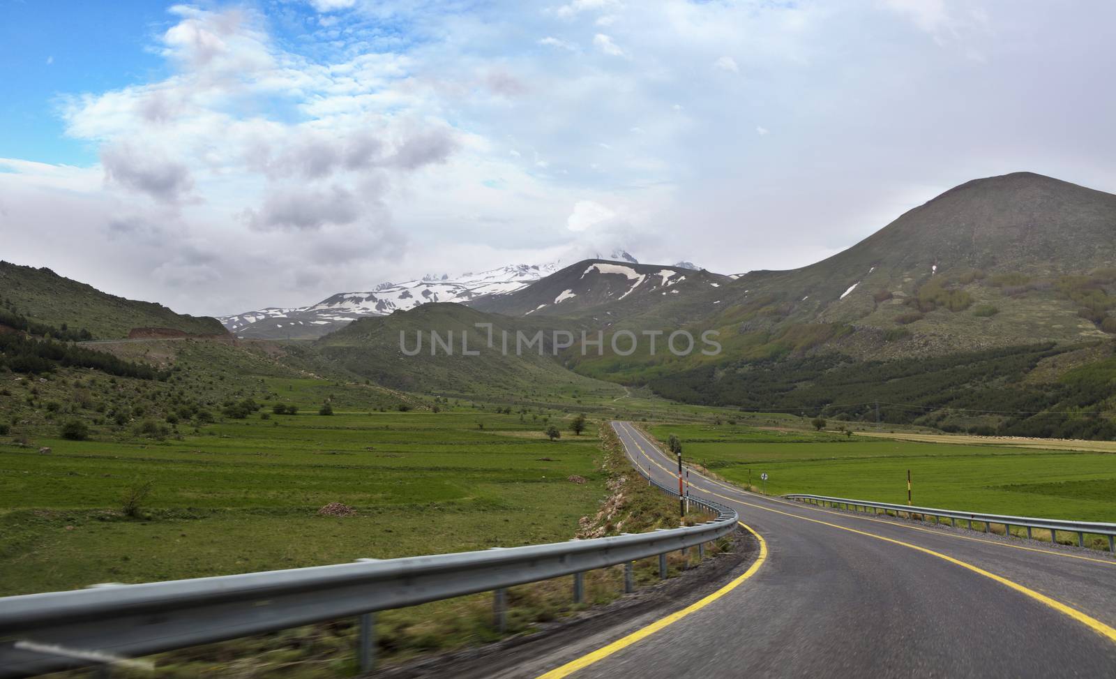 The highway leads from the city of Kayseri to the foot of Mount Erciyes, spring in central Turkey