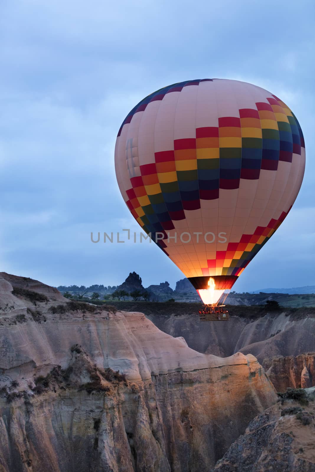 A view of the colored balloons flying over the Valley of Love at dawn. Cappadocia, Turkey.