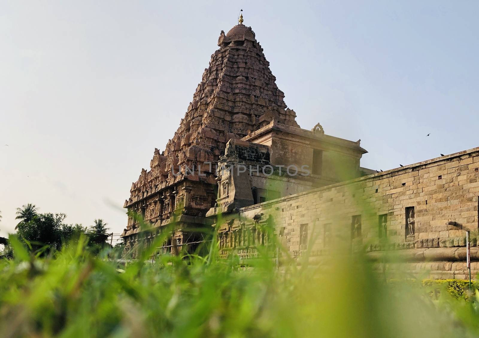 The Brihadisvara or Brihadeeswar temple located in Gangaikonda Cholapuram, Tamilnadu is one of the oldest structure built by Rajendra Chola-I in 11th Century AD. This is the Hindu temple built in Dravidian architecture style. The temple is entirely built with granite stones and the temple contains many monolithic sculptures in it. Also tamil words are inscribed in the wall of the temple. This temple is dedicated to Lord shiva and it is a UNESCO world heritage site.