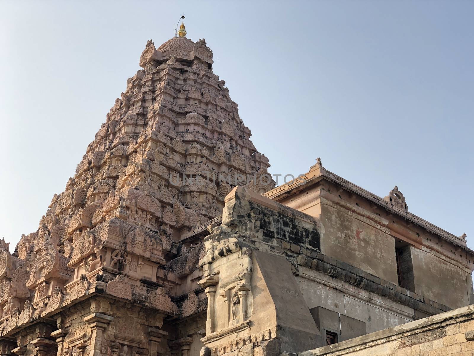 The Brihadisvara or Brihadeeswar temple located in Gangaikonda Cholapuram, Tamilnadu is one of the oldest structure built by Rajendra Chola-I in 11th Century AD. This is the Hindu temple built in Dravidian architecture style. The temple is entirely built with granite stones and the temple contains many monolithic sculptures in it. Also tamil words are inscribed in the wall of the temple. This temple is dedicated to Lord shiva and it is a UNESCO world heritage site.