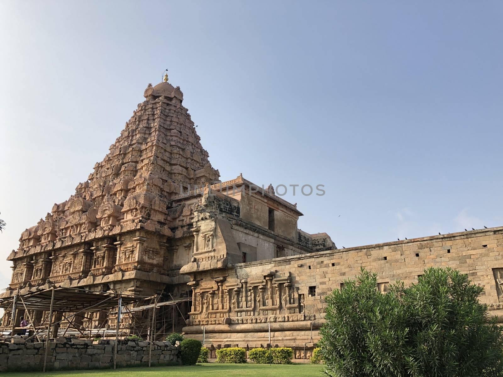The Brihadisvara or Brihadeeswar temple located in Gangaikonda Cholapuram, Tamilnadu is one of the oldest structure built by Rajendra Chola-I in 11th Century AD. This is the Hindu temple built in Dravidian architecture style. The temple is entirely built with granite stones and the temple contains many monolithic sculptures in it. Also tamil words are inscribed in the wall of the temple. This temple is dedicated to Lord shiva and it is a UNESCO world heritage site.