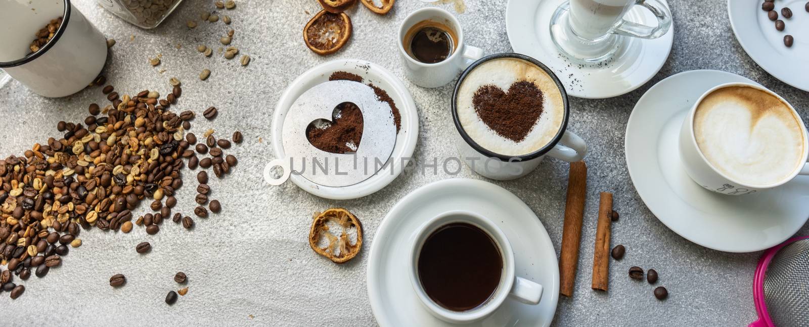 Coffee drink varieties concept on stone background with copy space