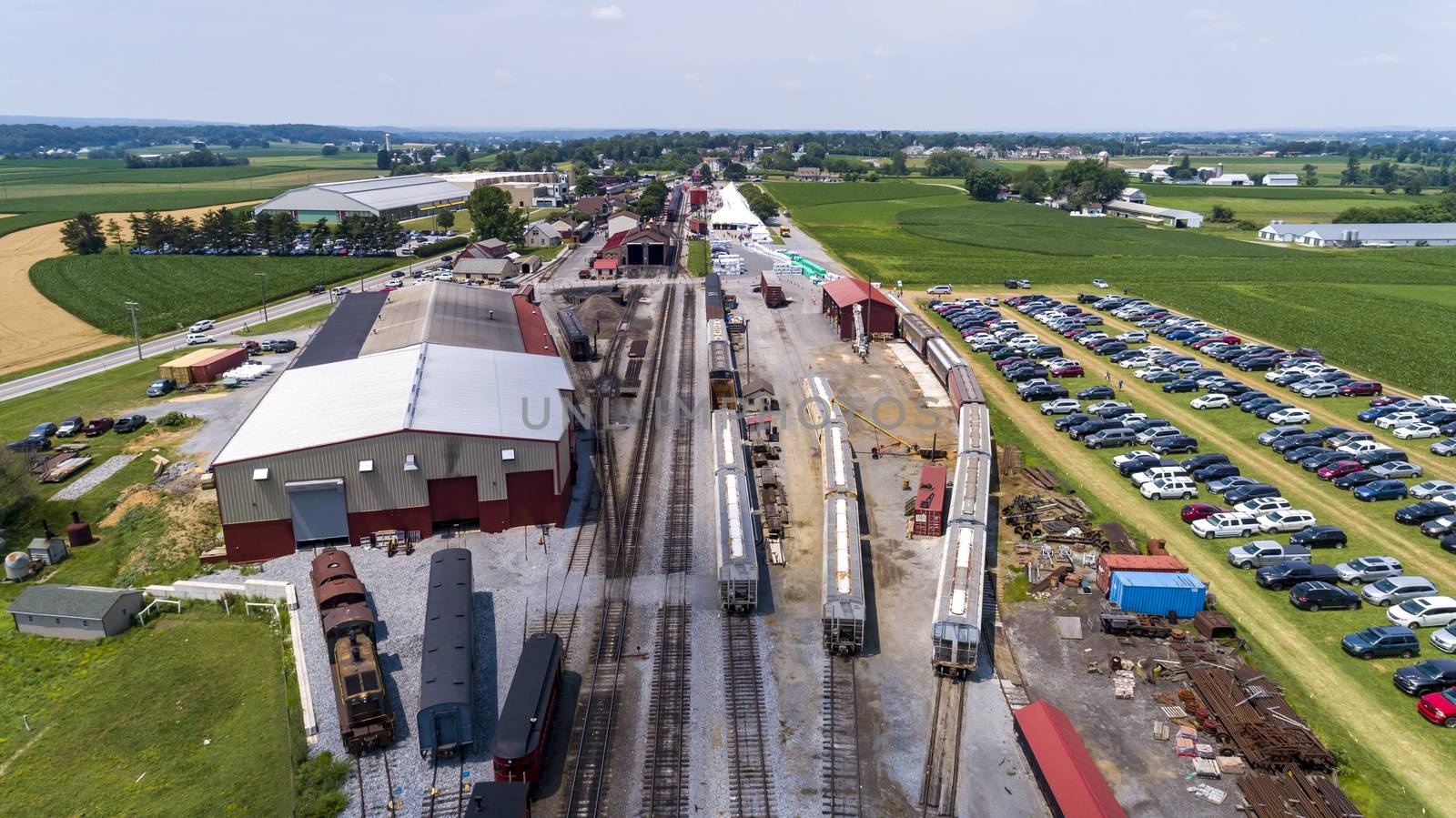 Aerial View of Train Yard Waiting for Trains on a Sunny Summer Day