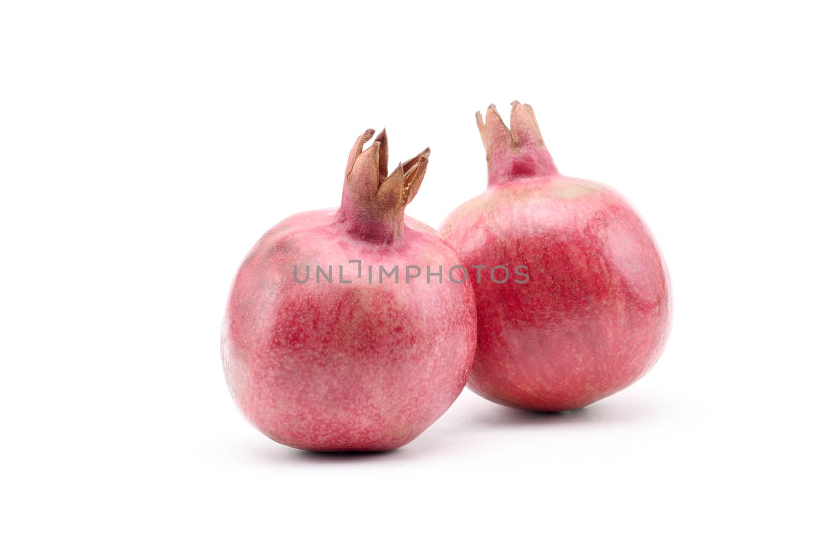 Pomegranate on a white background.Natural.For Isolation. by moviephoto