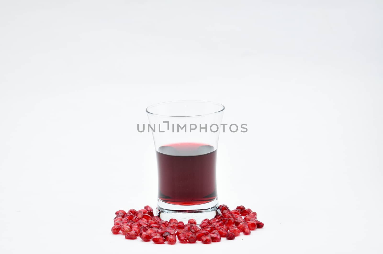 Pomegranate on a white background.Natural.For Isolation. by moviephoto