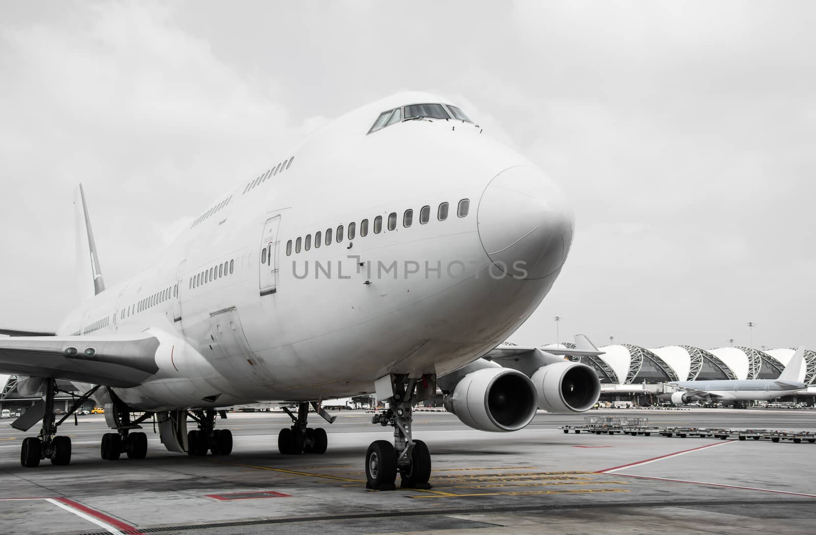 Passenger planes at the airport shoot on the bus