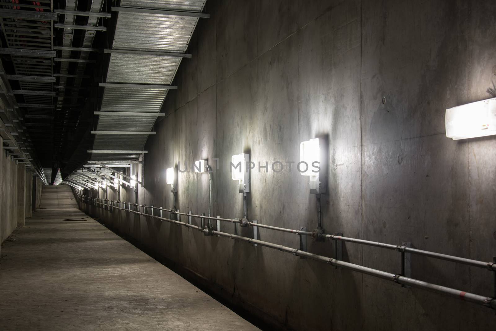Empty industrial garage room interior with concrete floor and wall background