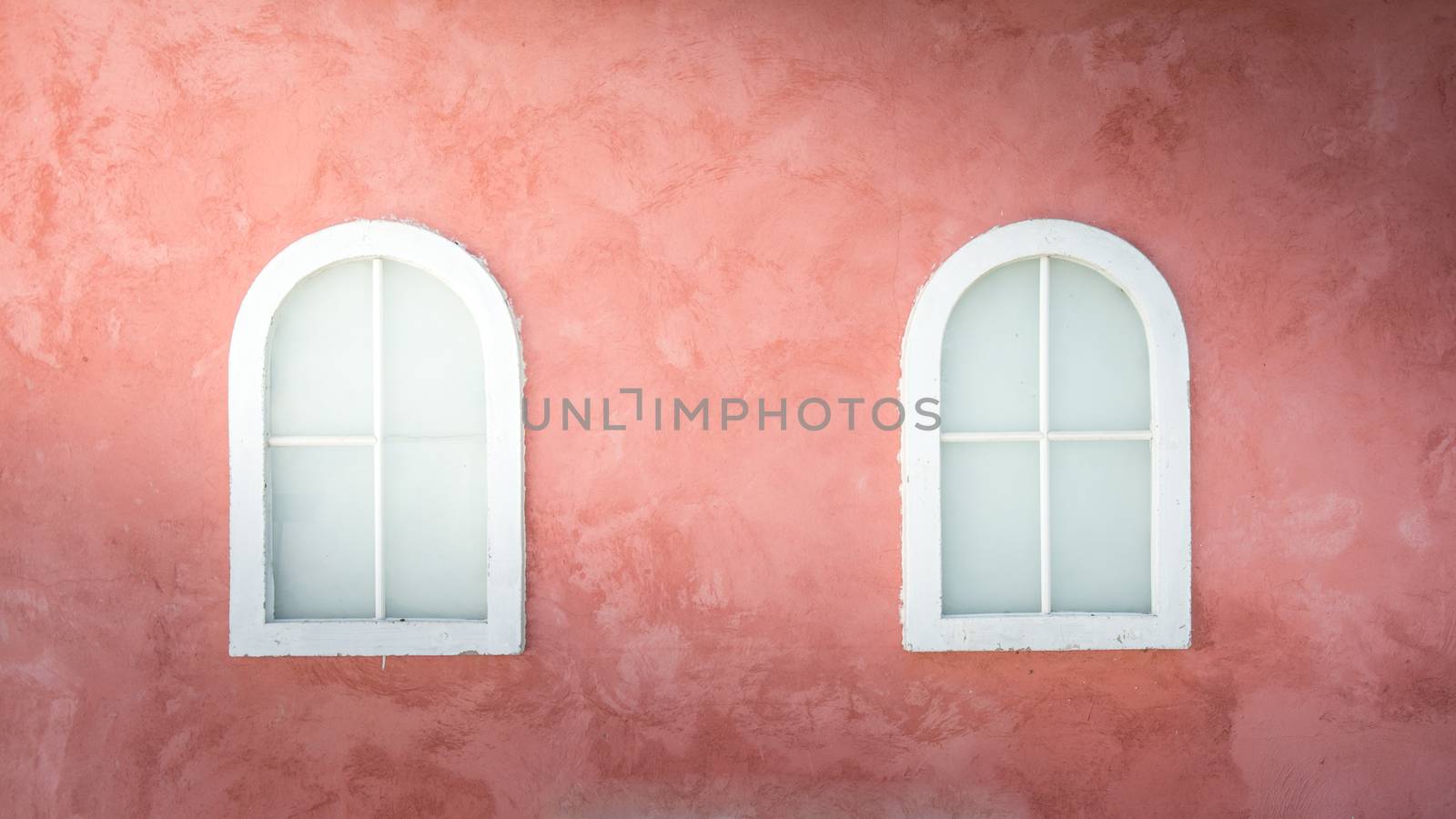 light on Vintage window on nice color cement wall can be used for background
