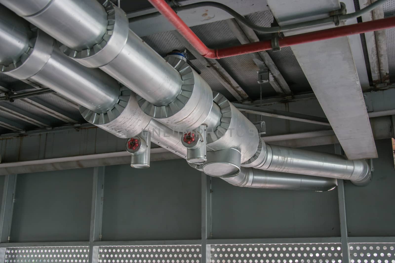 cables and piping as found inside of a thermal power