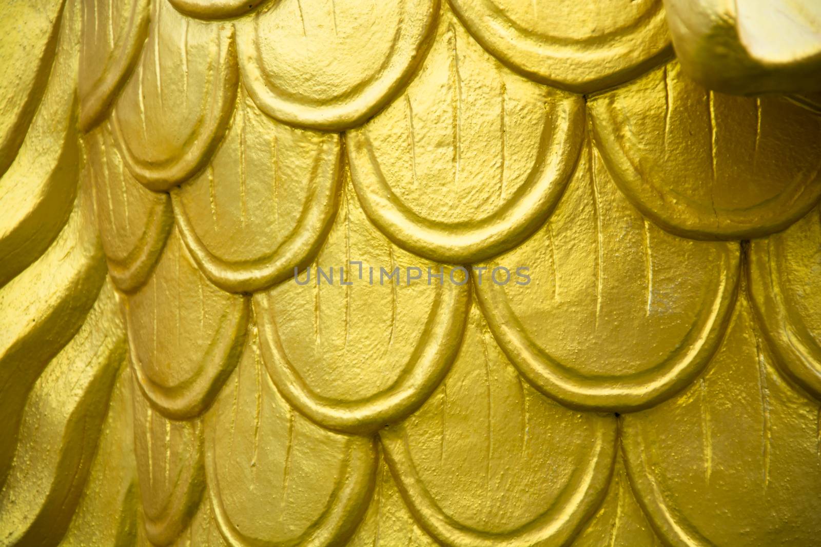 Gold carp scales statue