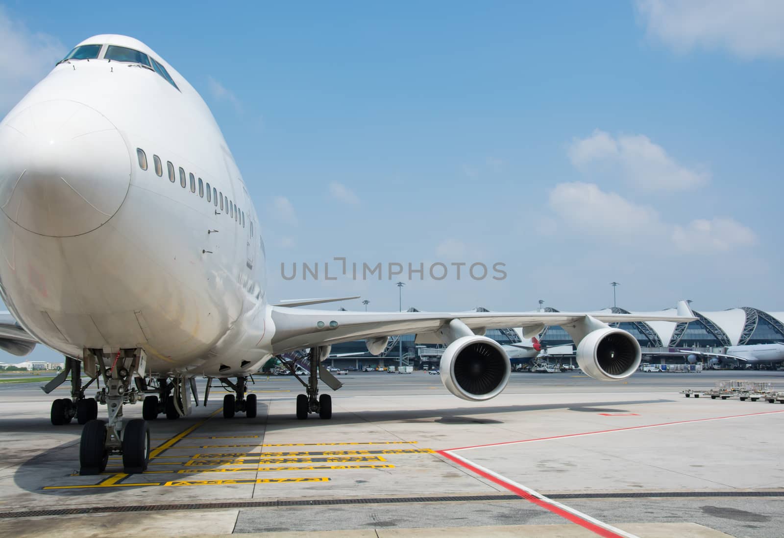 Passenger planes at the airport shoot on the bus