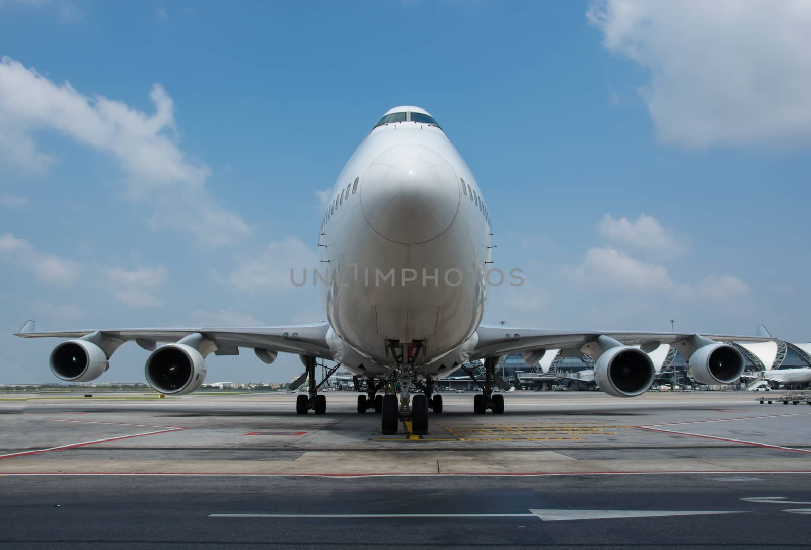 Passenger planes at the airport shoot on the bus