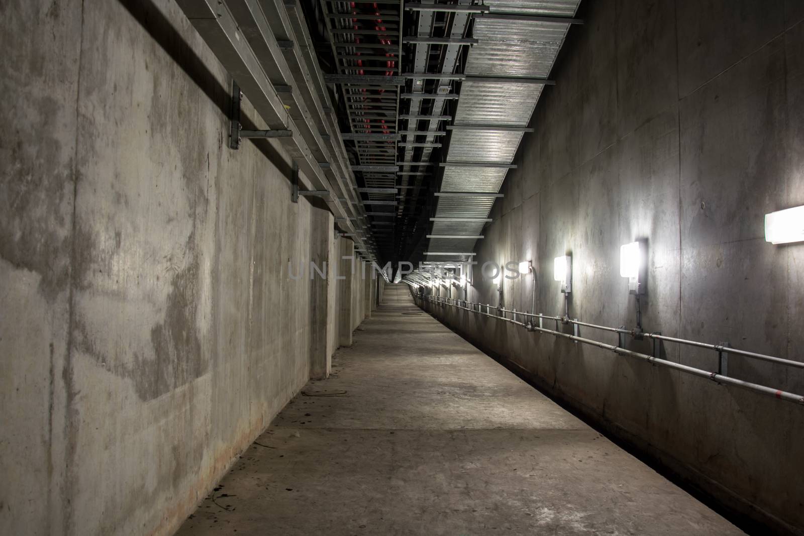 Empty industrial garage room interior with concrete floor and wall background