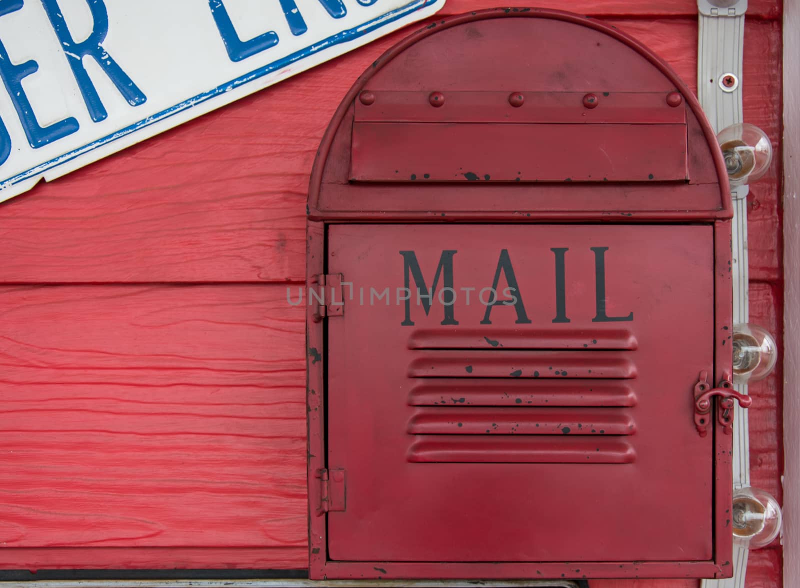 vintage mailbox on wood wall