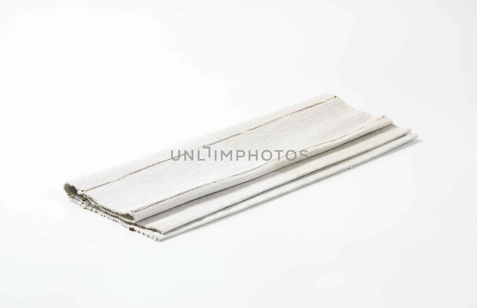 Ribbed off white cotton place mat