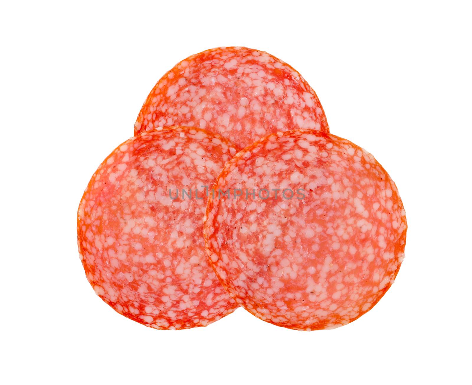 Thin slices of Hungarian salami isolated on white