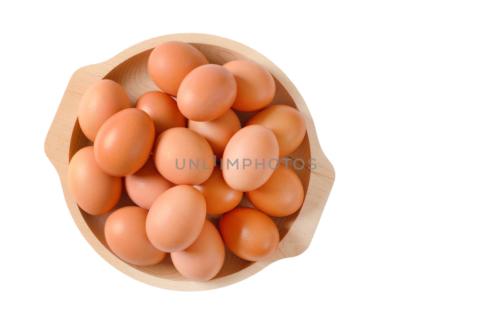 Fresh brown eggs in wooden bowl isolated on white