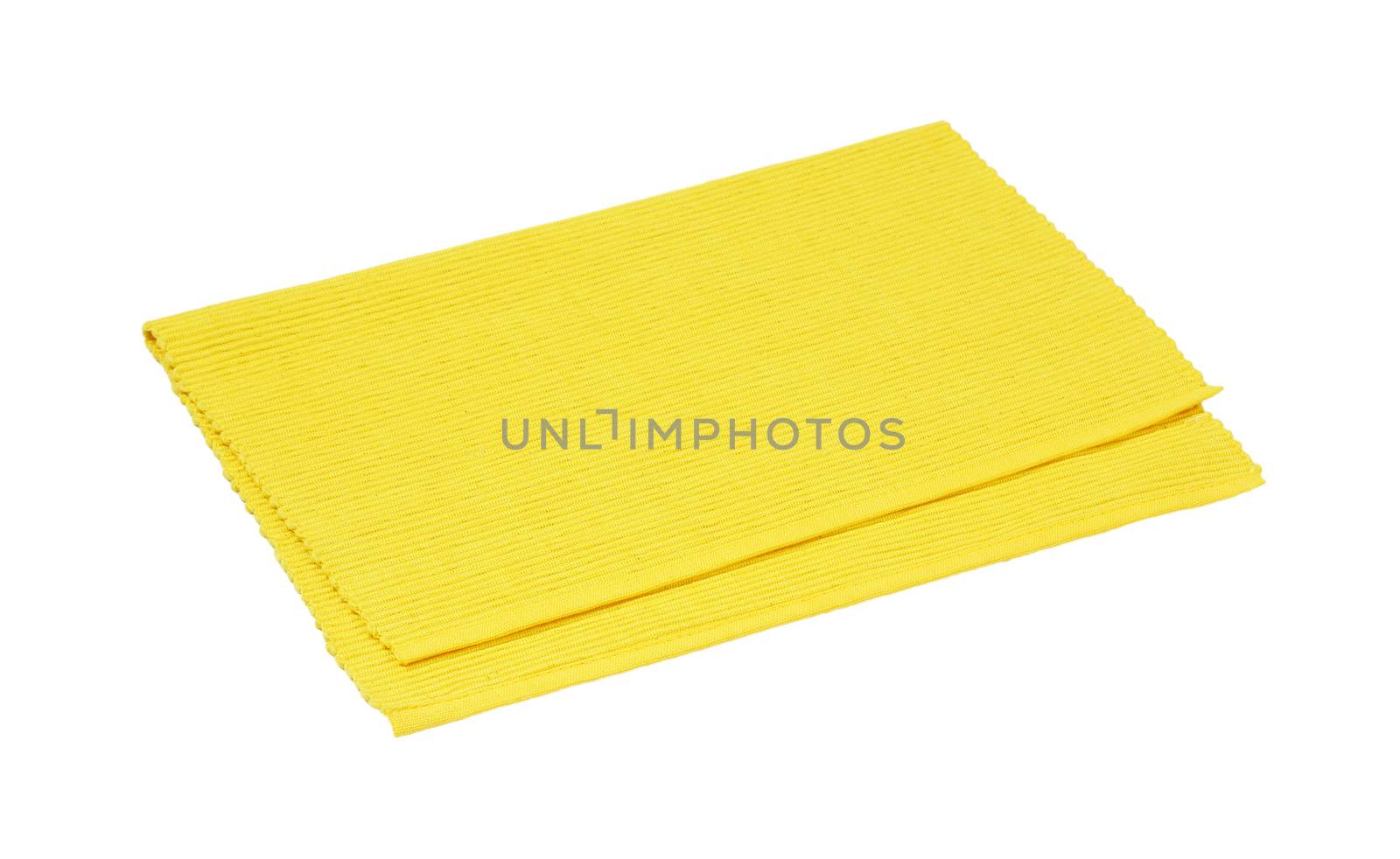 Yellow woven cotton place mat folded in half isolated on white