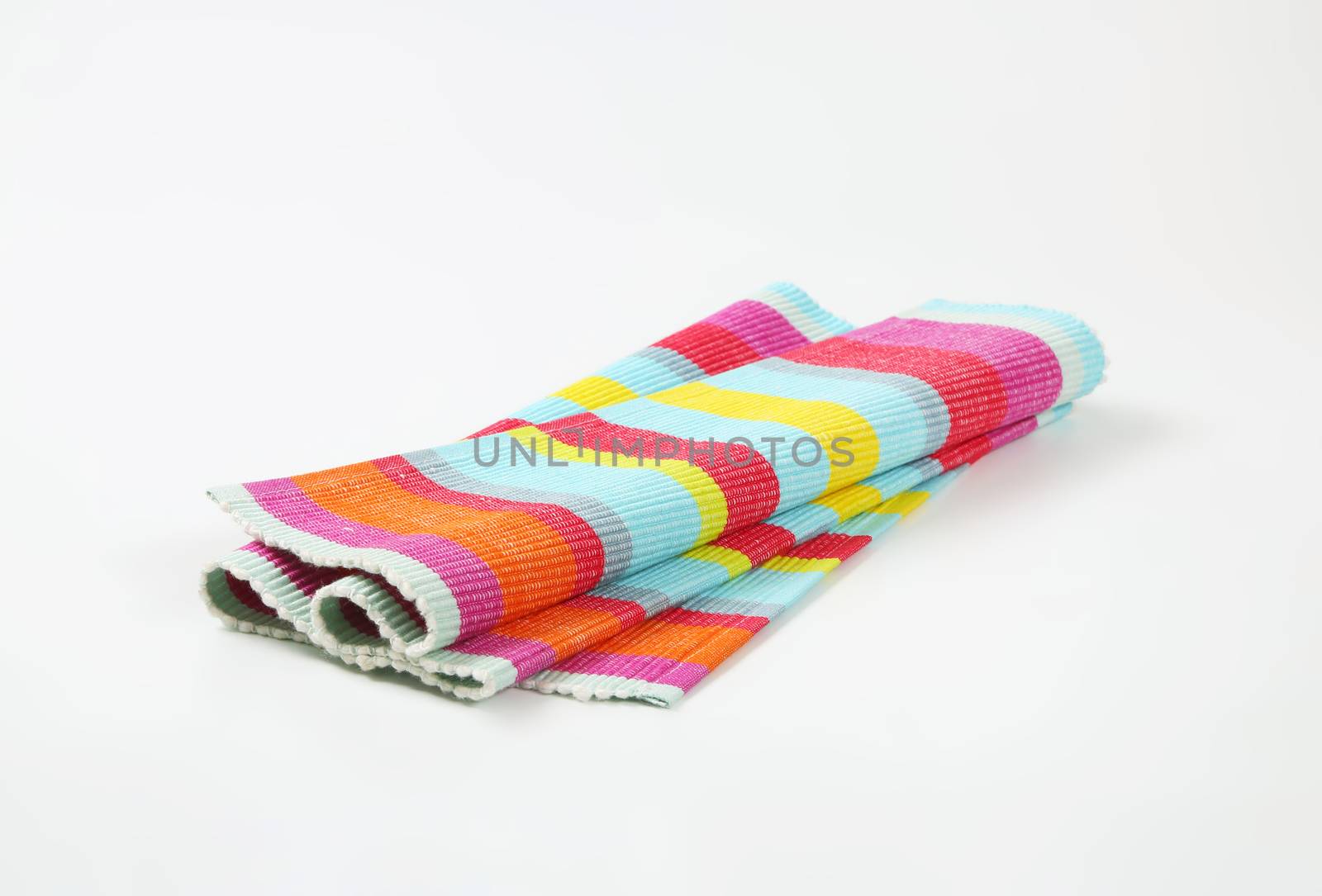 Colorful striped ribbed woven cotton place mat - folded