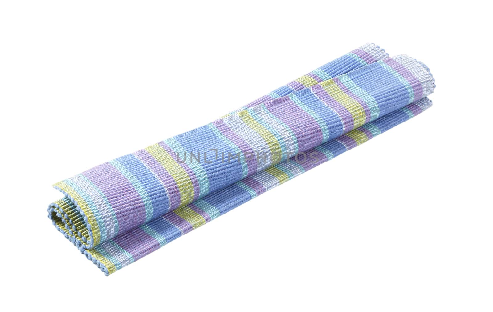 Colorful striped ribbed woven cotton place mat isolated on white
