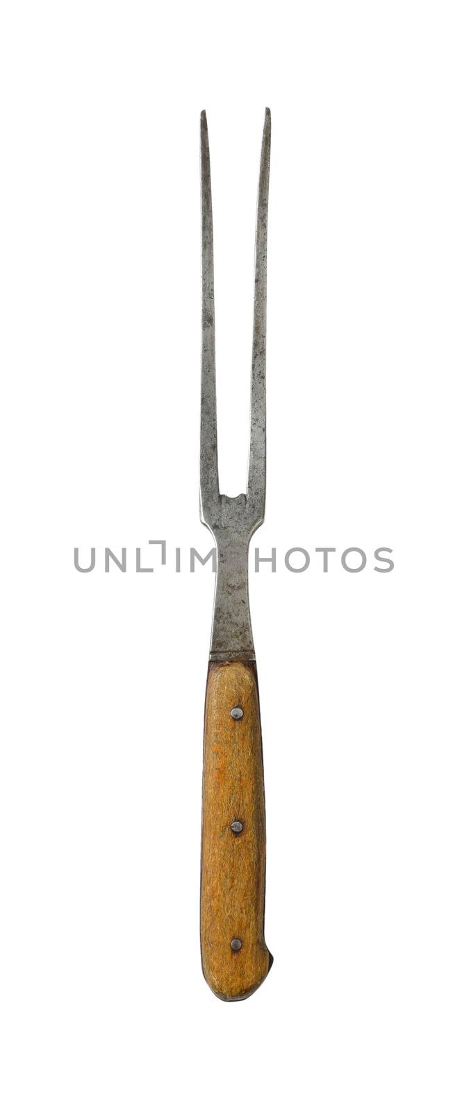 Old carving / meat fork with wood handle isolated on white