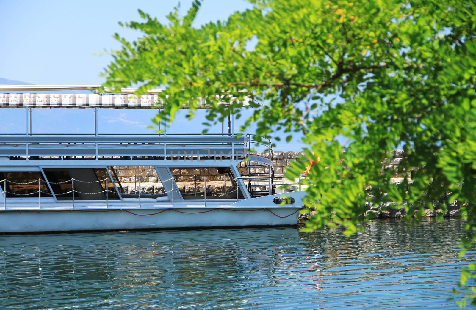 small tourist boat in lake