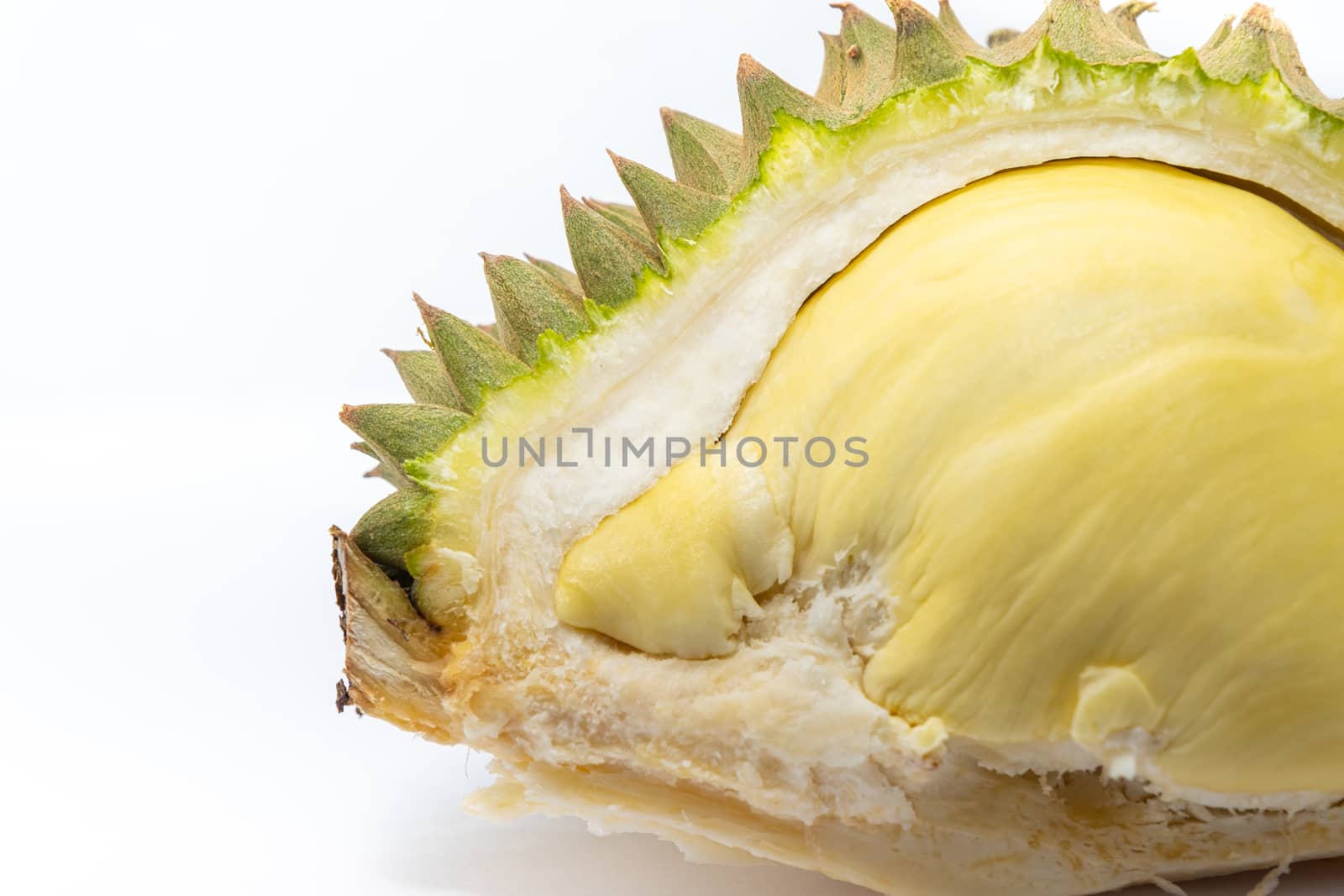 Close up peeled Durian isolated on white background for eat, the famous fruit from Thailand, it also known as The King of Fruits. by peerapixs