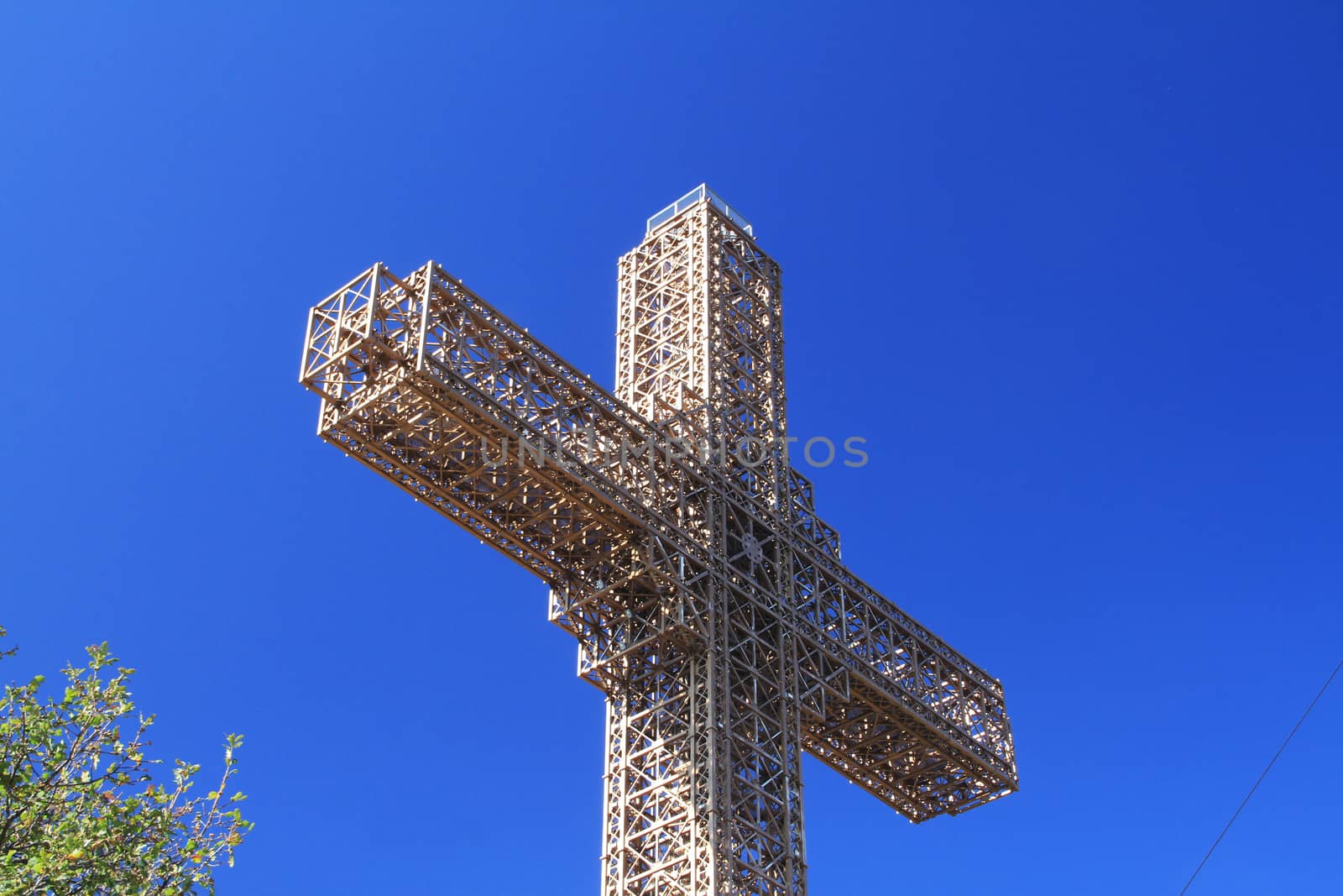 big cross in blue clear sky