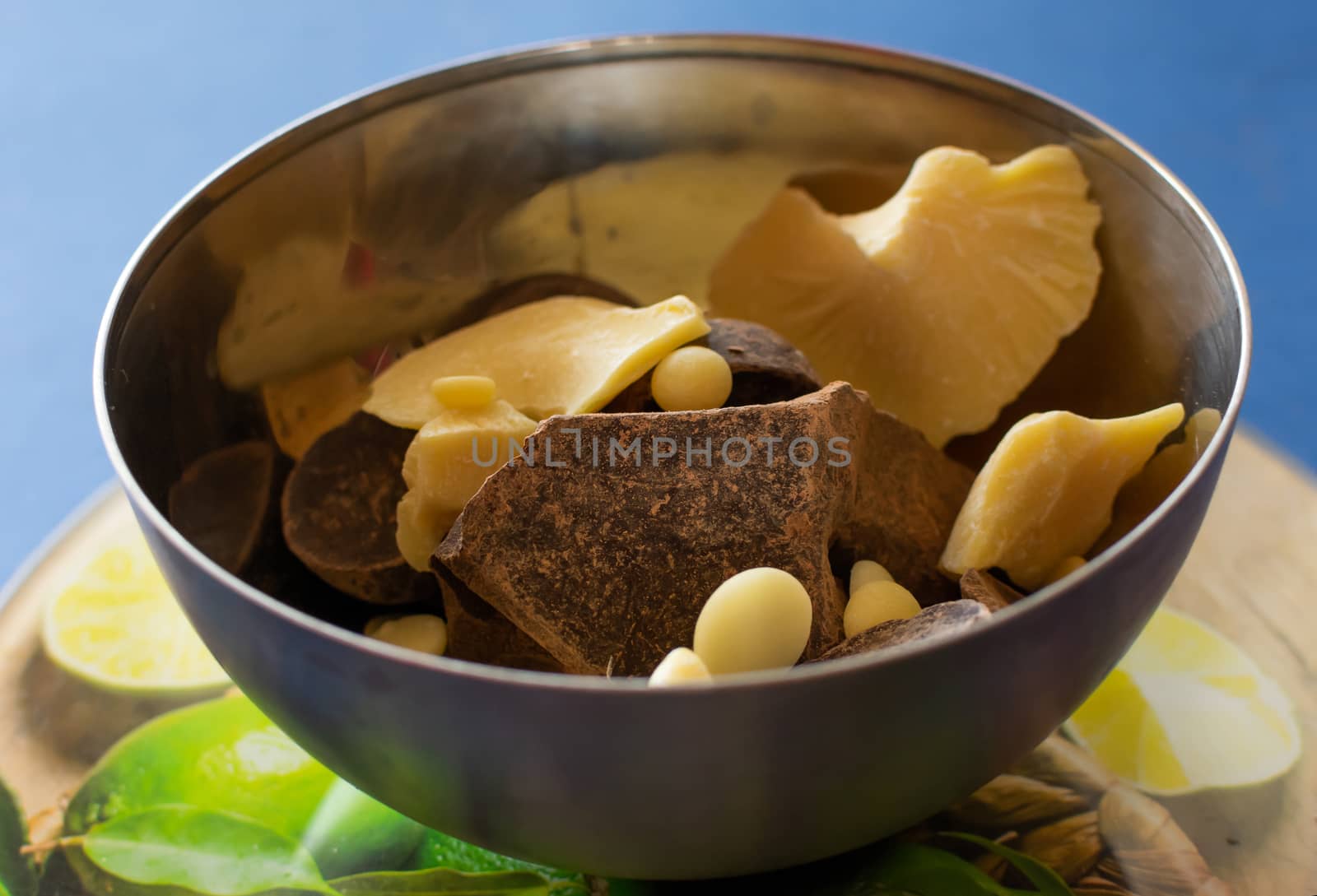 Broken pieces of dark bitter chocolate and white milk chocolate. Ingredients for home cooking of healthy sweets without sugar.