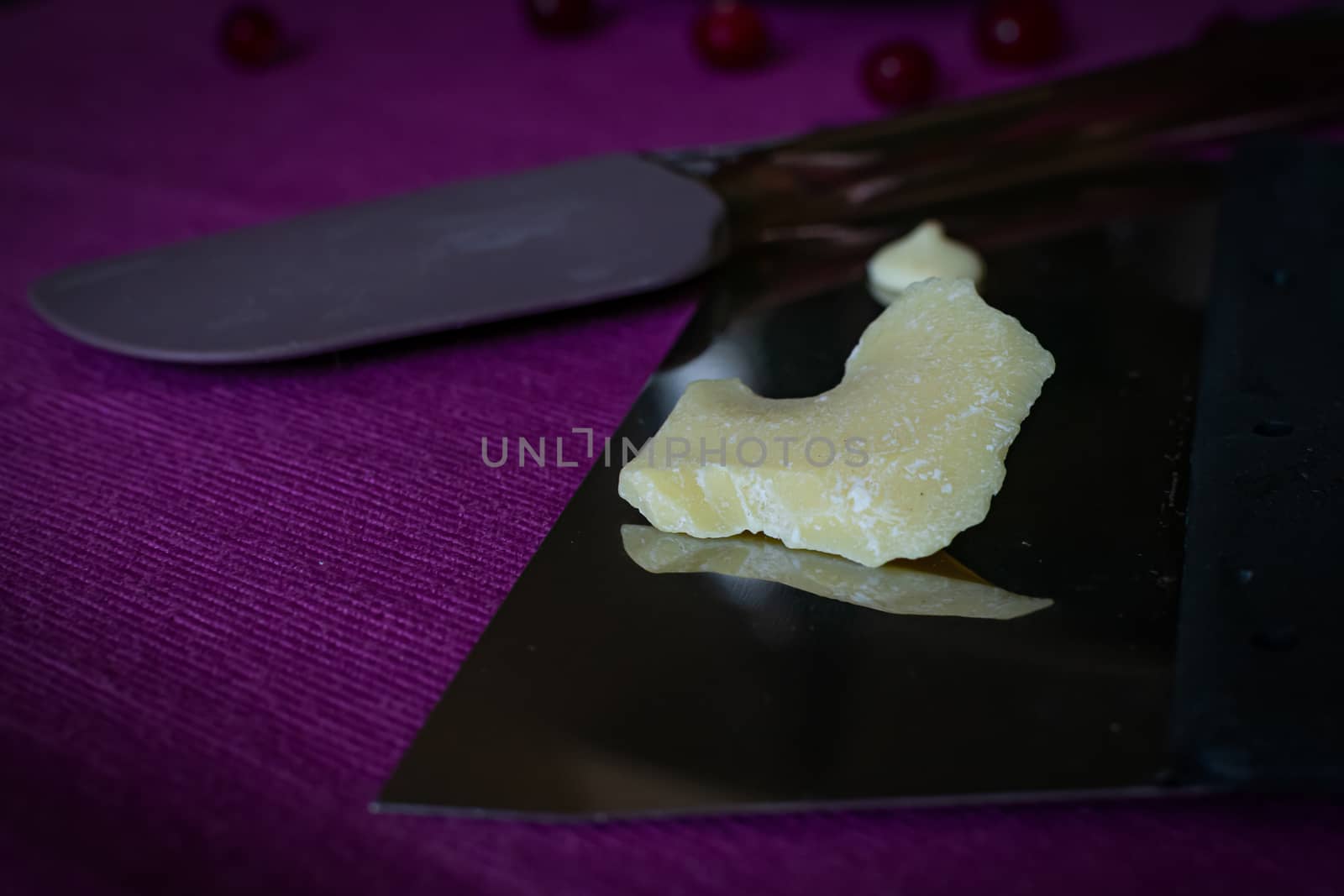 Close-up of a professional artisan pastry shop. A piece of white chocolate is prepared for home cooking delicious sweets by bonilook