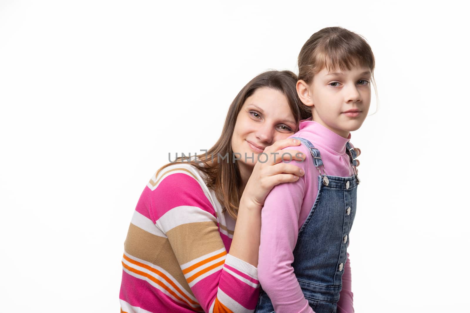 Happy mother put her head on her daughters back, isolated on white background