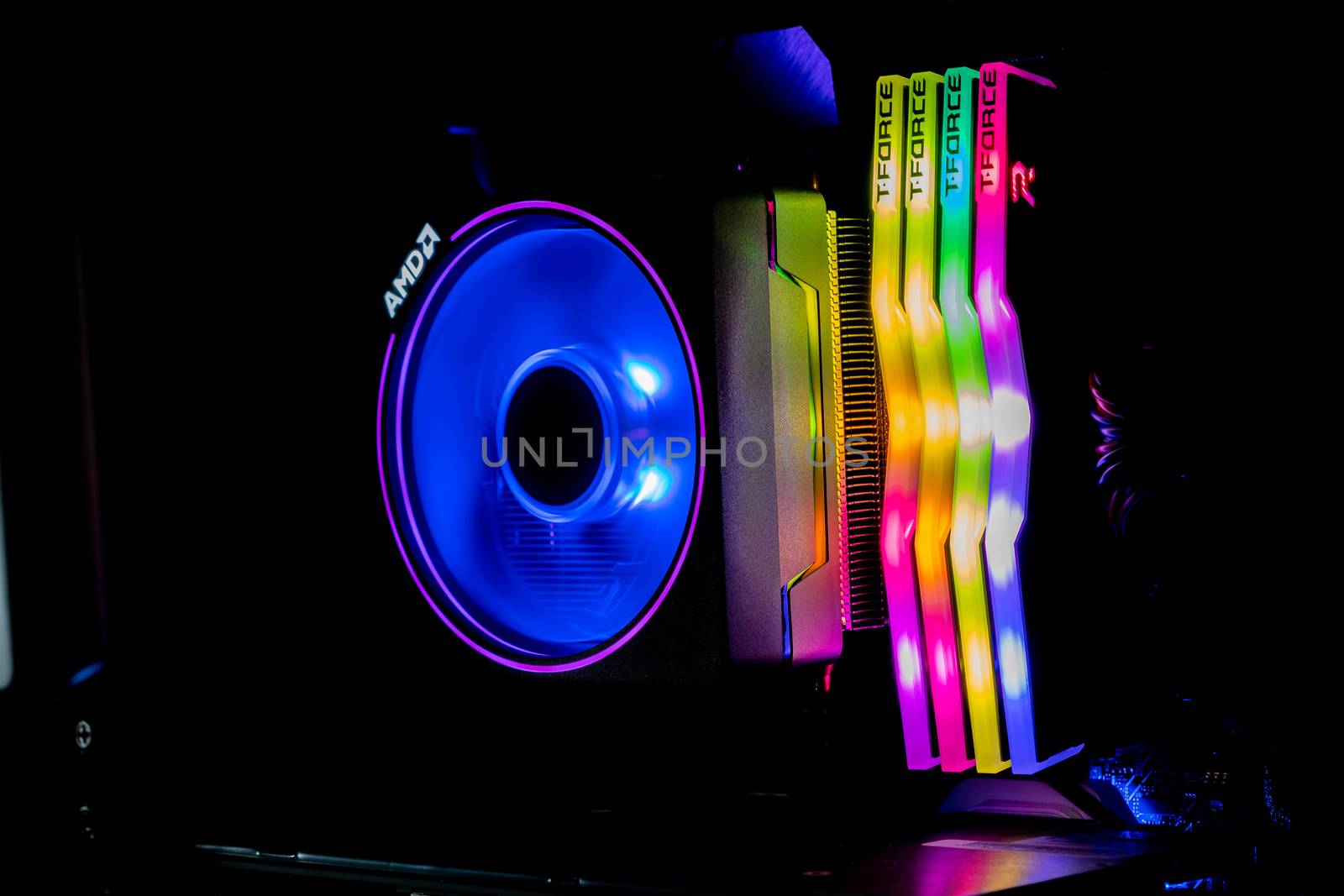 Chonburi, Thailand - MAY 16, 2020: The colorful of AMD Wraith Prism Cooler for CPU Ryzen9 3900X with four T-Force DELTA RGB DDR4 DIMMs in the computer case.