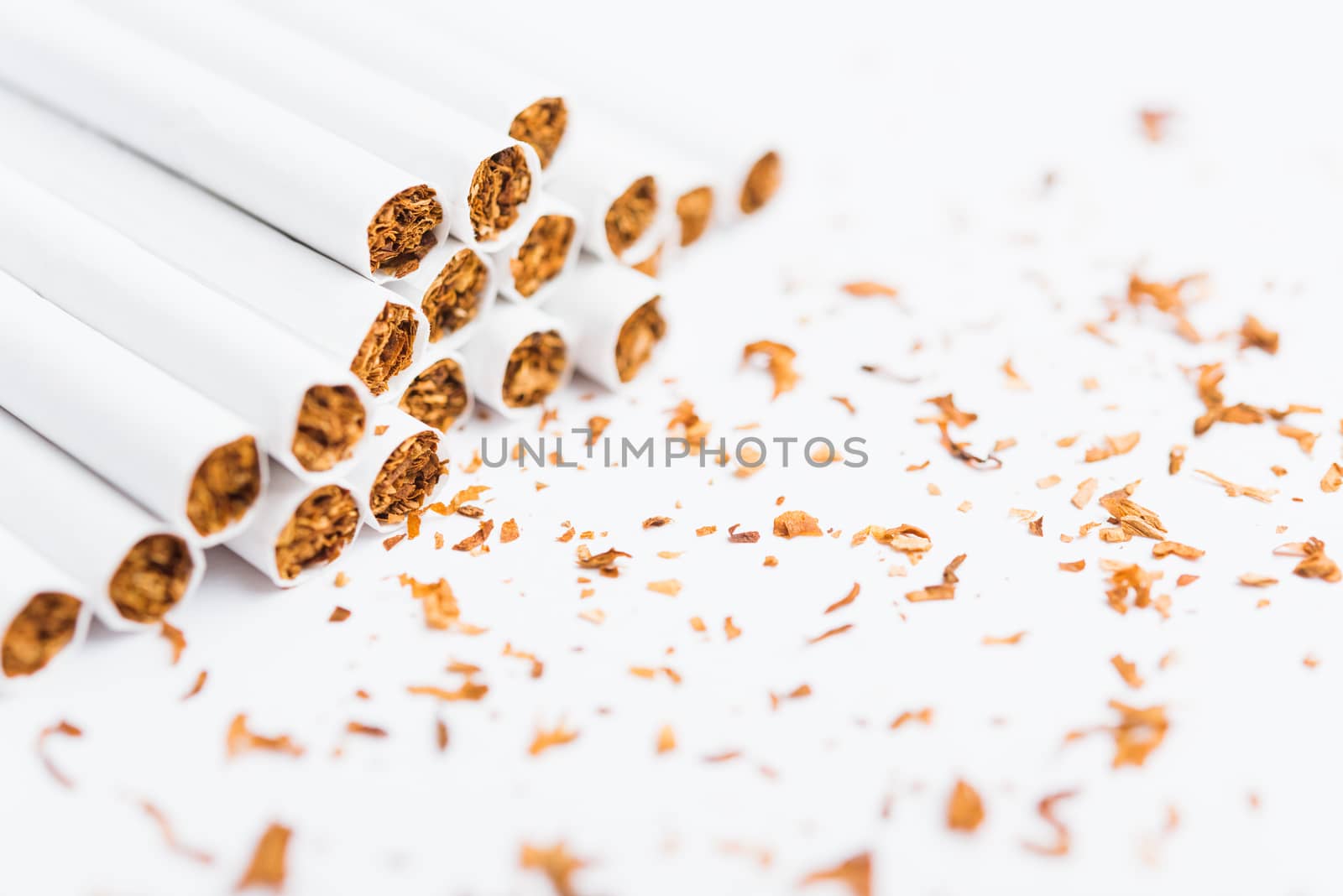 31 May of World No Tobacco Day, Close up front stack pile cigarette or tobacco on white background with copy space, Warning lung health concept