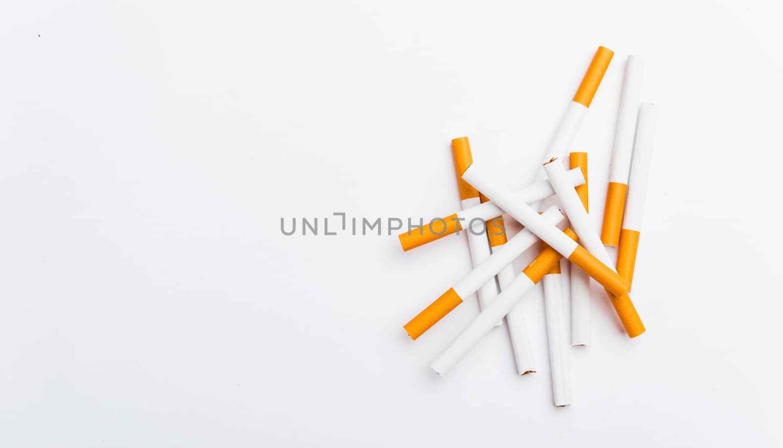 31 May of World No Tobacco Day, Close up front stack pile cigarette or tobacco on white background with copy space, Warning lung health concept