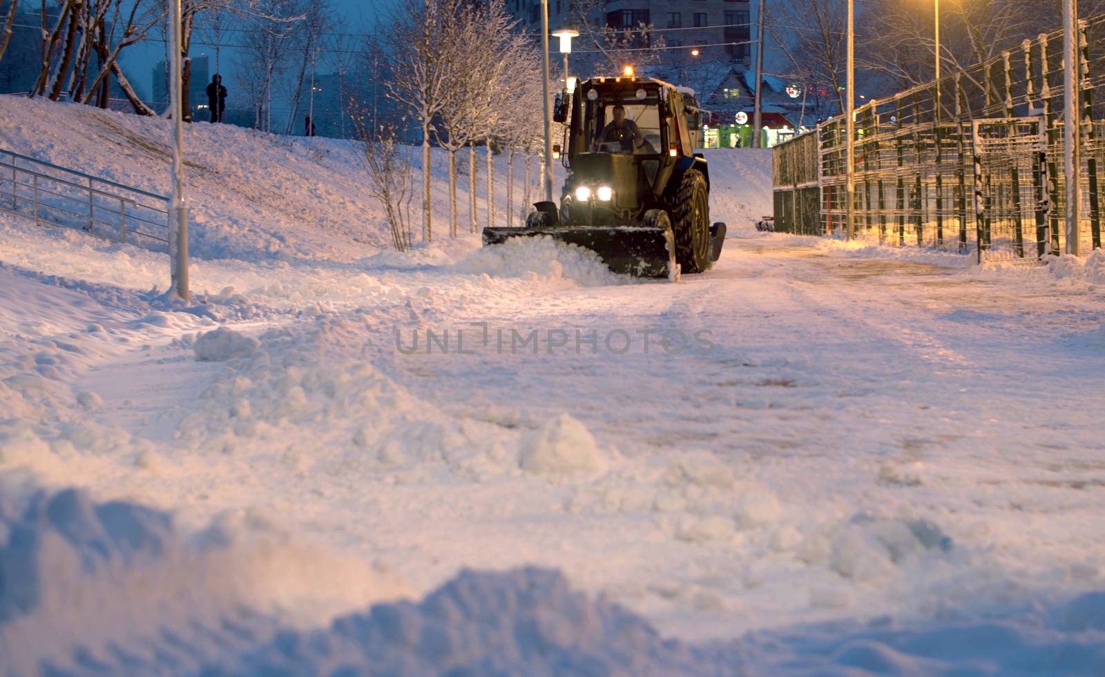 Clearing snow from the road. by Alize