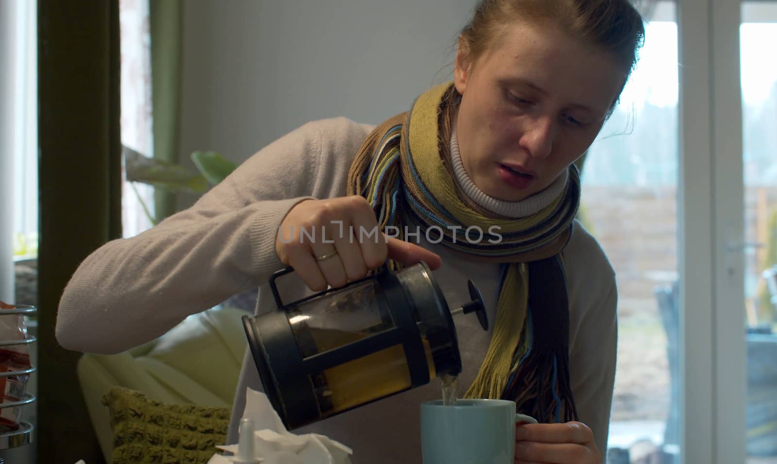 Flu woman drinking hot tea by Alize