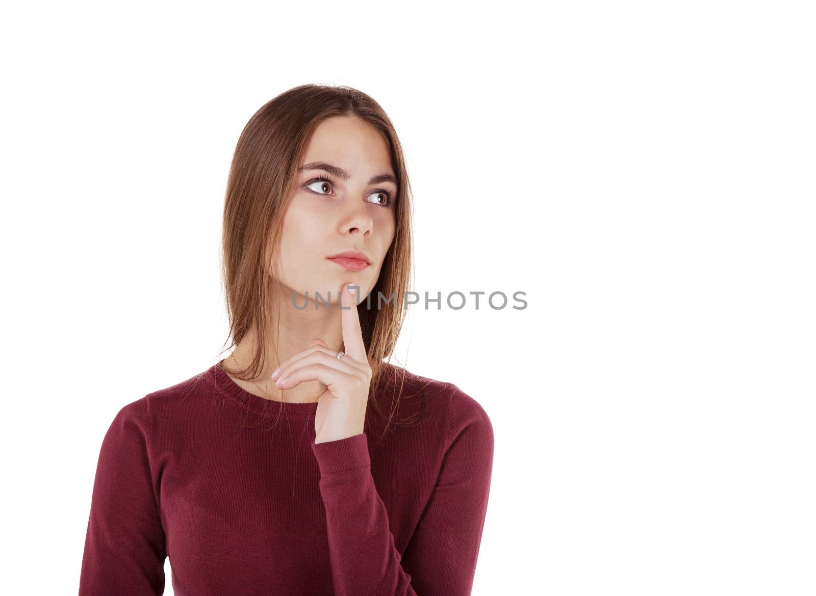 portrait of thoughtful girl in red sweater